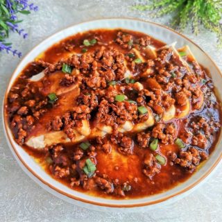 Steamed tofu and egg in minced meat sauce