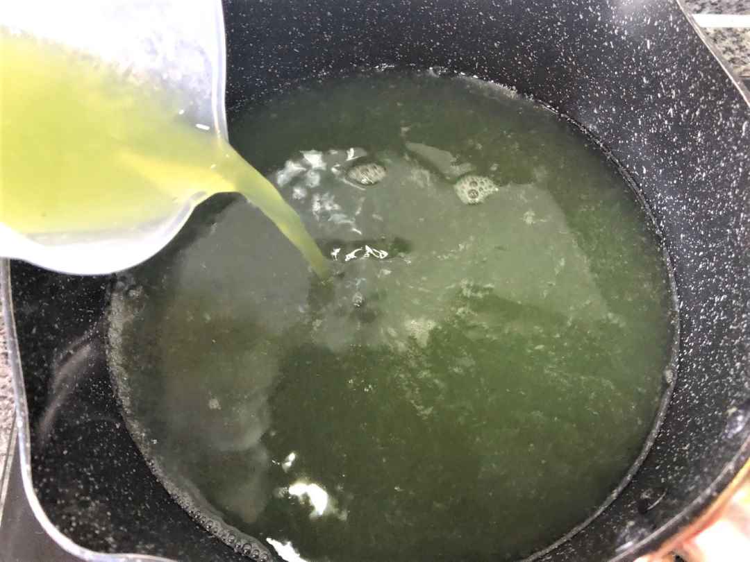 Pour in cucumber white jelly juice and bring to a boil