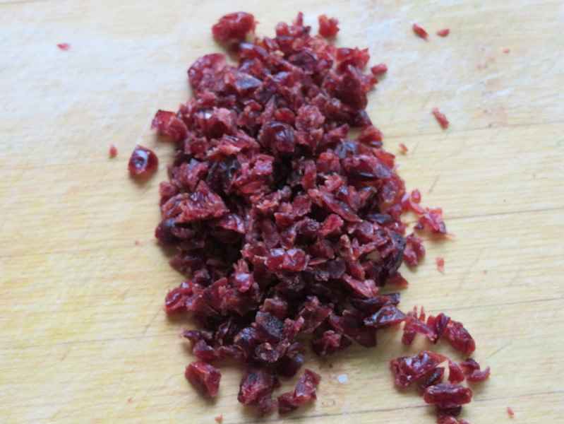 Chop the dried cranberries